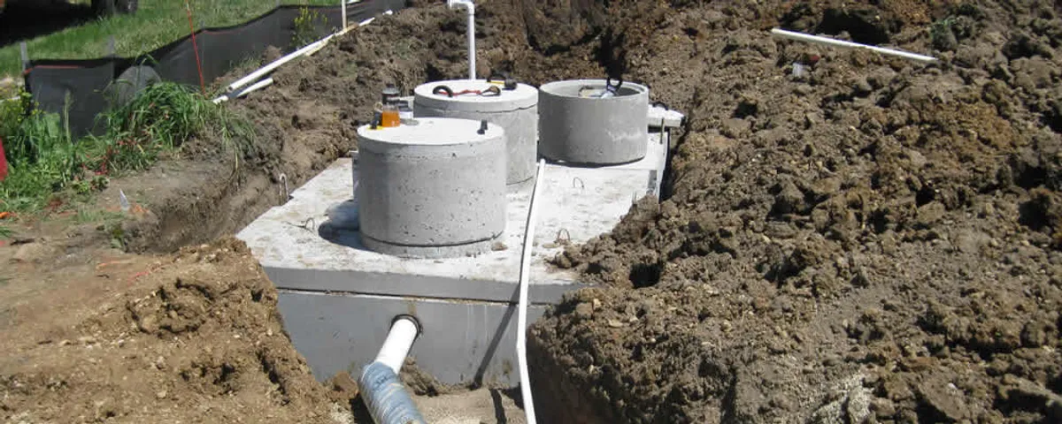 Septic system repair and installation site with tank access ports in Hoboken, NJ